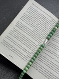 The Muse Necklace in green — sage-green glass beads with baroque stick pearl, handmade by Salty Gypsy