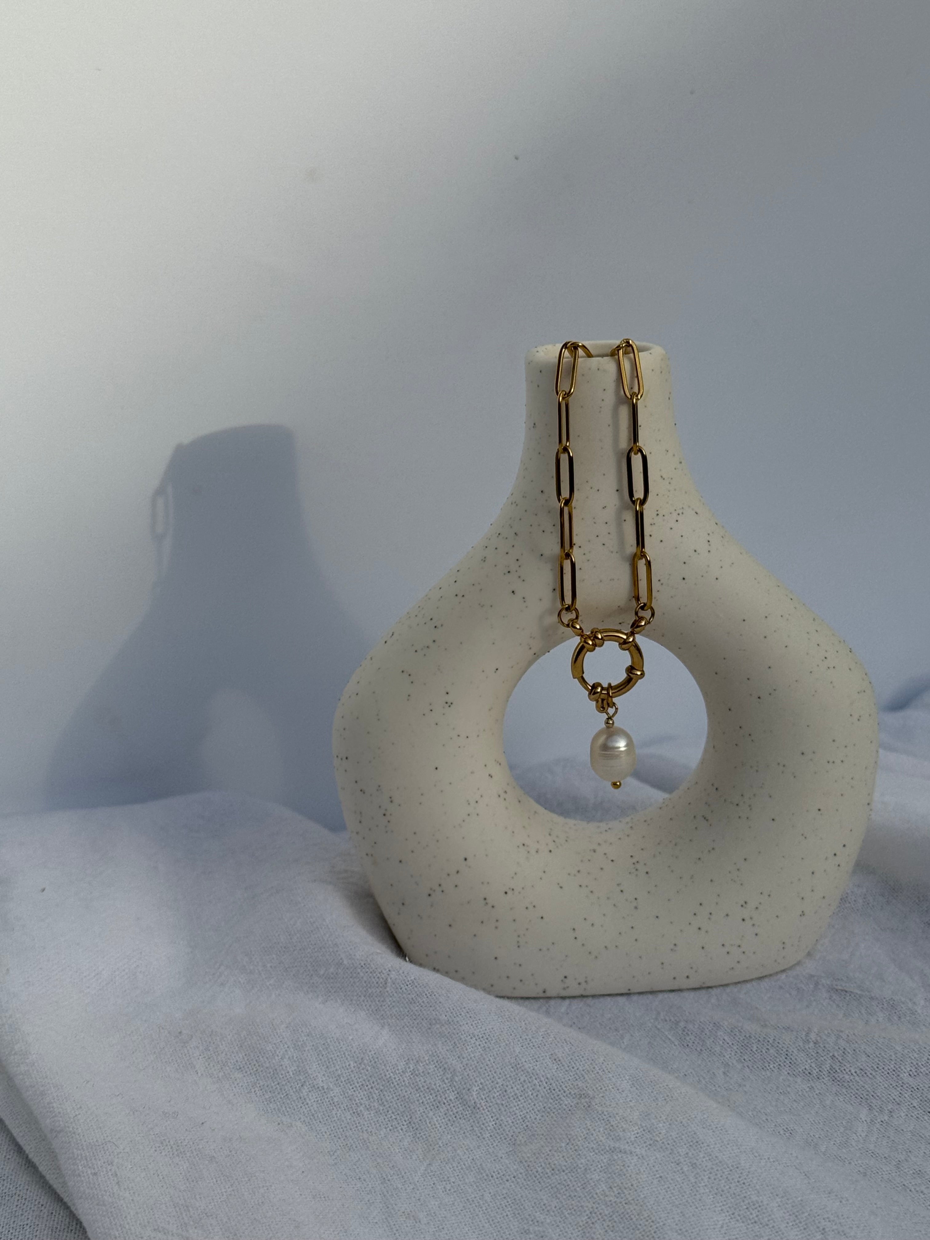 Aluna gold paperclip chain necklace with front clasp and potato pearl pendant, handmade by Salty Gypsy