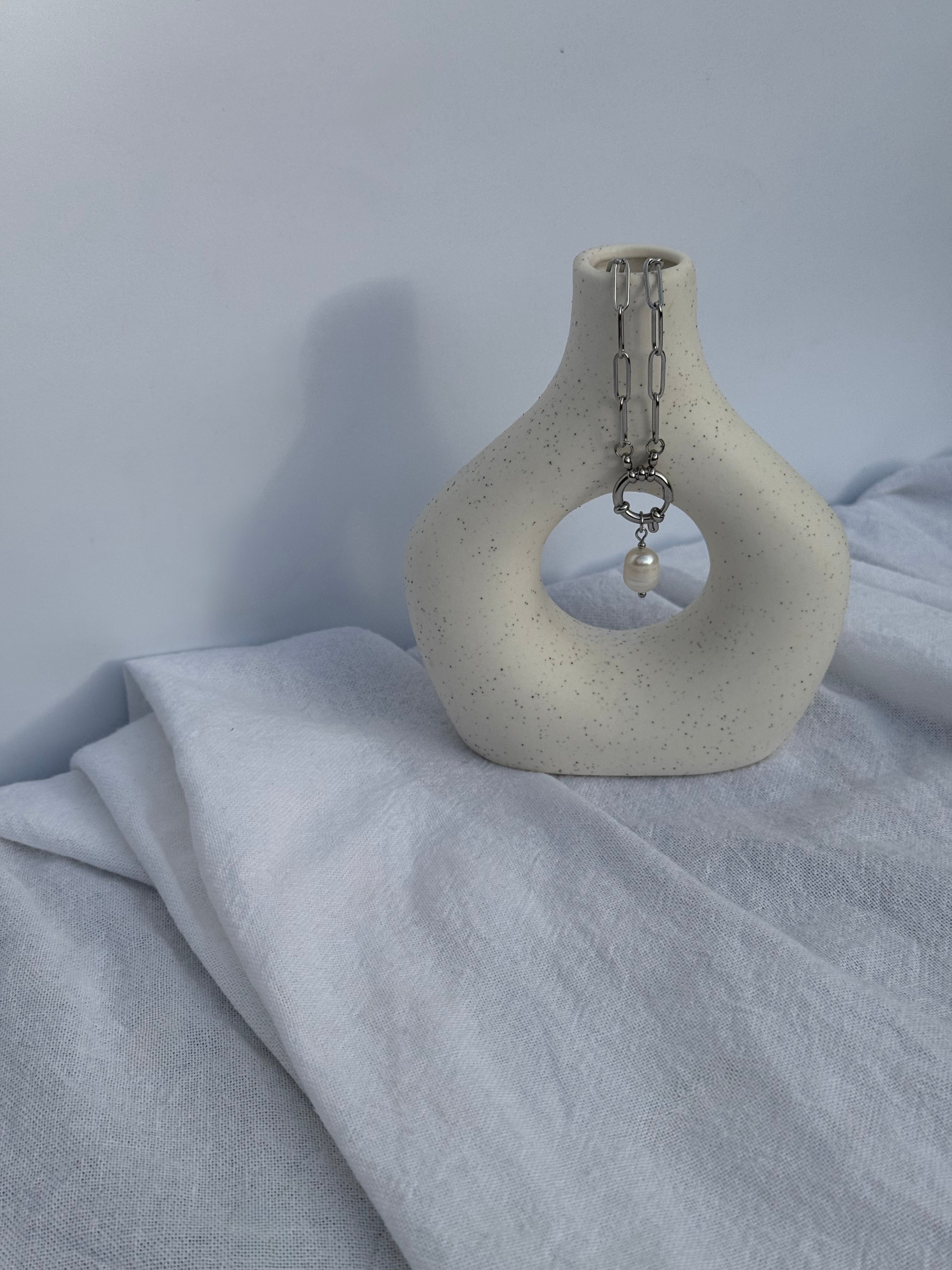 Aluna silver paperclip chain necklace with front clasp and potato pearl pendant, handmade by Salty Gypsy