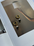 Harlow chunky gold huggie hoop earrings with green glass bead and freshwater pearl charm, handmade statement jewellery by Salty Gypsy