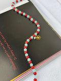 Hot Tropic Gold beaded necklace handmade with blue and red glass beads, hibiscus charm and rice pearl by Salty Gypsy
