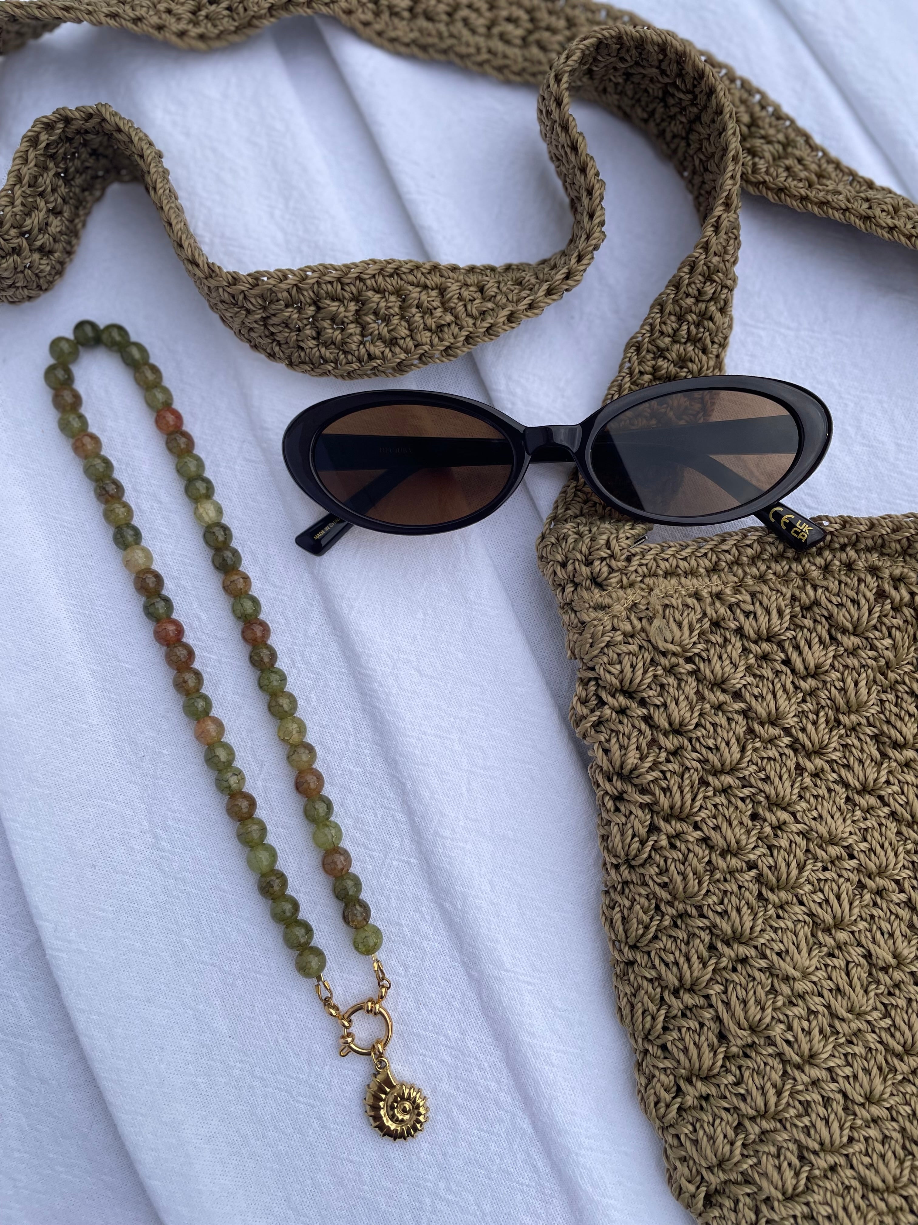 Juniper Necklace in green and gold — moss green glass beads with spiral shell pendant and 18K gold detailing, handmade by Salty Gypsy