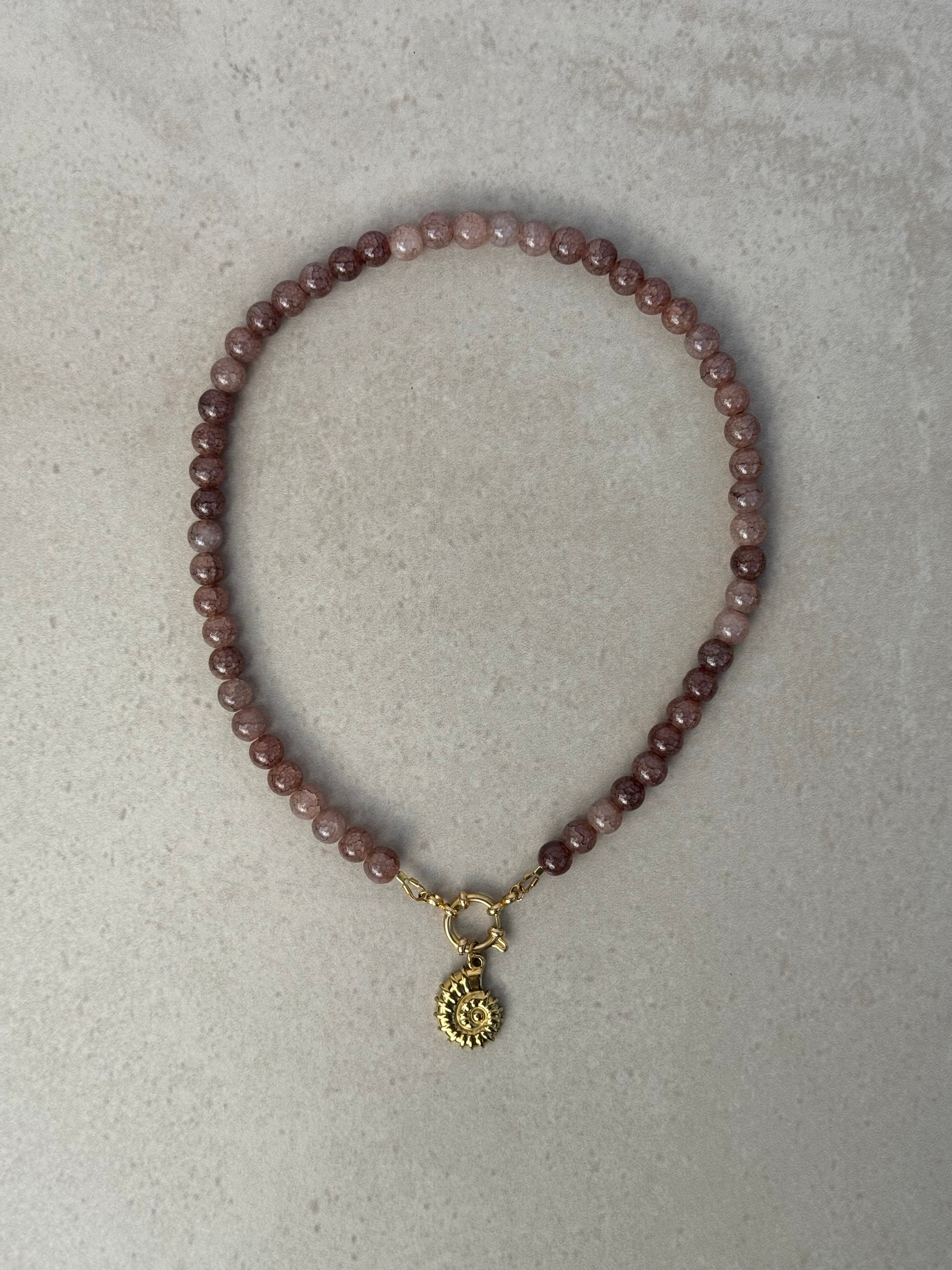 Juniper Necklace in dusky amethyst and gold — glass bead and spiral shell necklace by Salty Gypsy