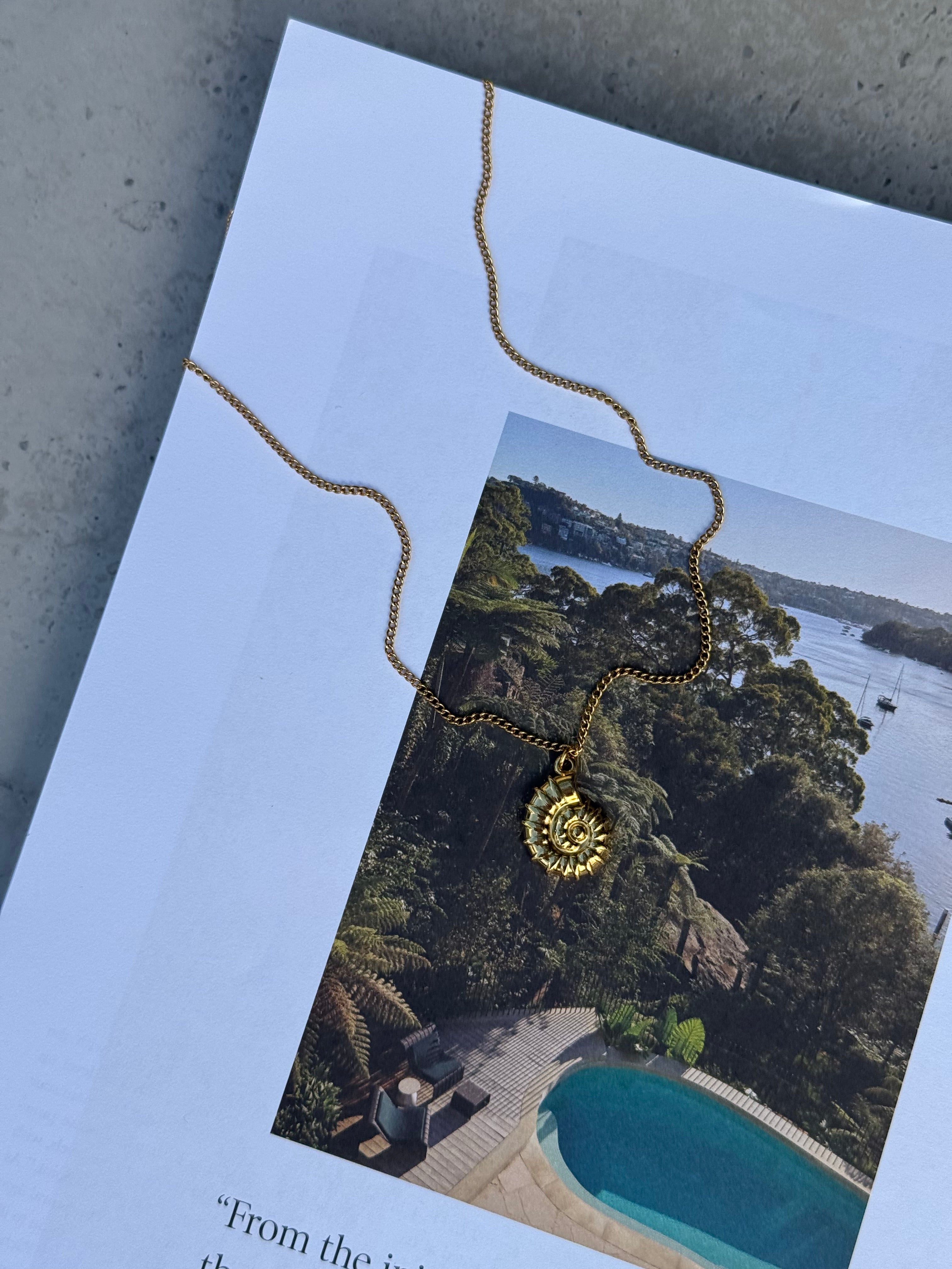 Nixie Gold Chain — stainless steel curb chain with spiral shell pendant, handmade by Salty Gypsy