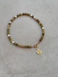 Nyx Necklace in green and gold — moss green glass beads with scattered pearls and removable snake charm, handmade by Salty Gypsy