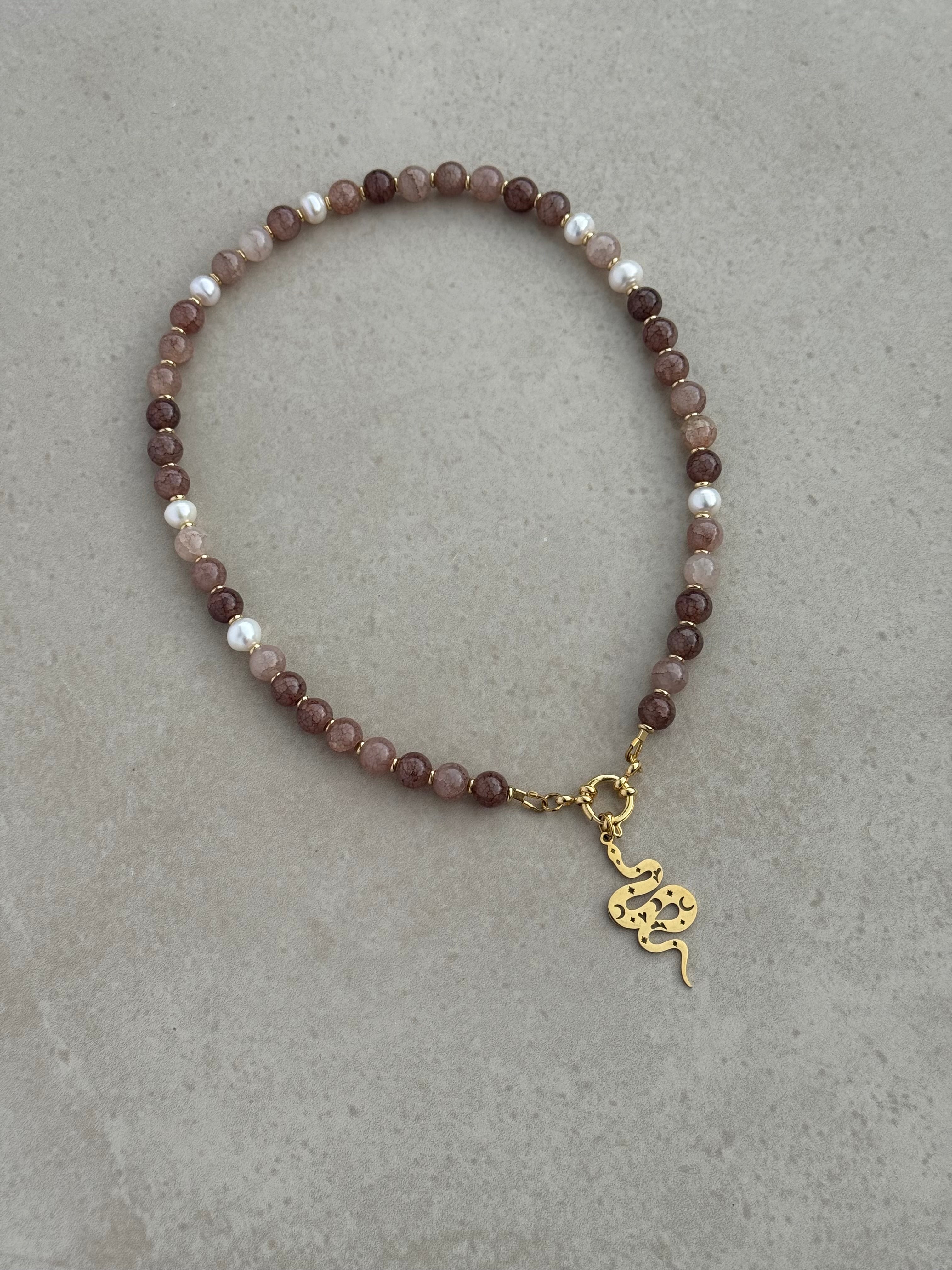 Nyx Necklace in purple and gold — dusky amethyst glass beads with scattered pearls and removable snake charm, handmade by Salty Gypsy
