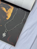 Nyx Silver Chain & Snake Pendant — stainless steel paperclip chain with sinuous snake pendant, handmade by Salty Gypsy