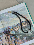 Sloane necklace featuring black glass beads, baroque fireball pearl and gold detailing, handmade jewellery by Salty Gypsy
