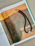 Sloane necklace featuring brown glass beads, baroque fireball pearl and gold detailing, handmade jewellery by Salty Gypsy