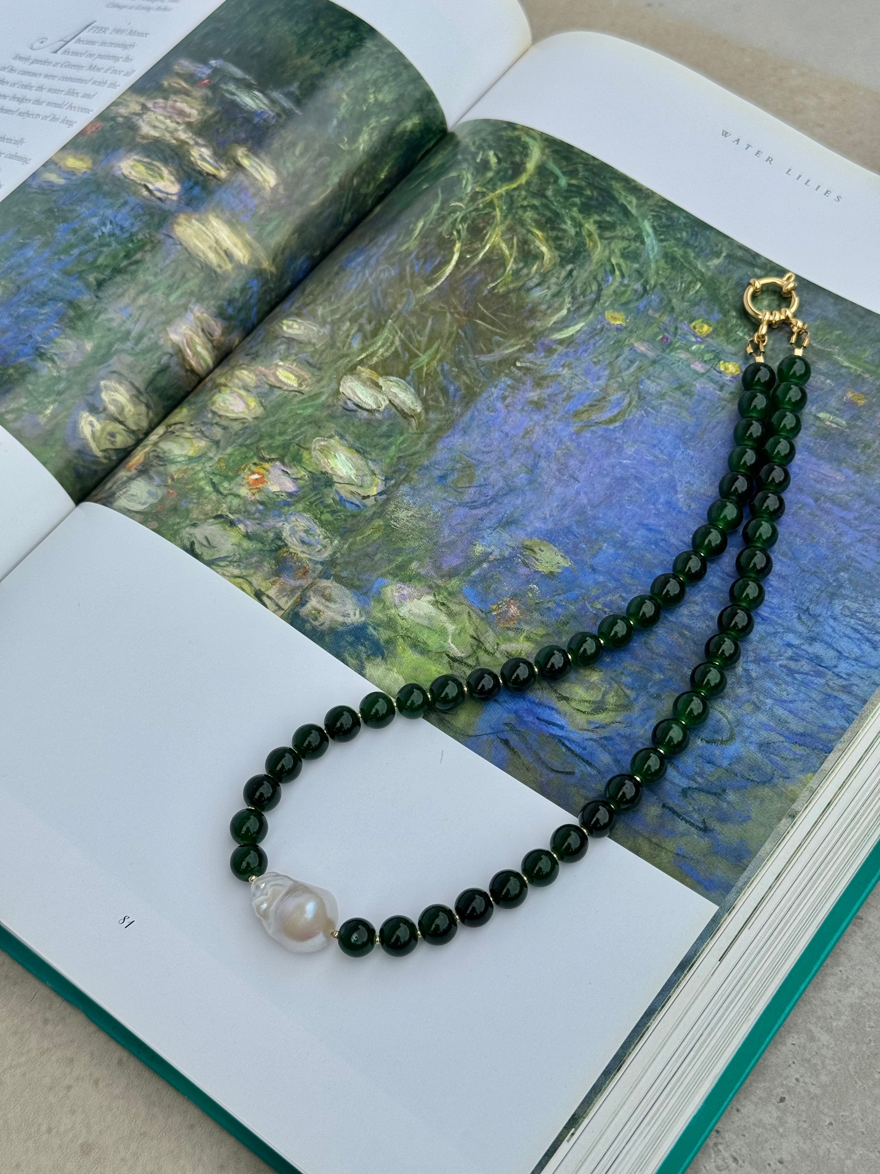 Sloane necklace featuring deep green glass beads, baroque fireball pearl and gold detailing, handmade jewellery by Salty Gypsy